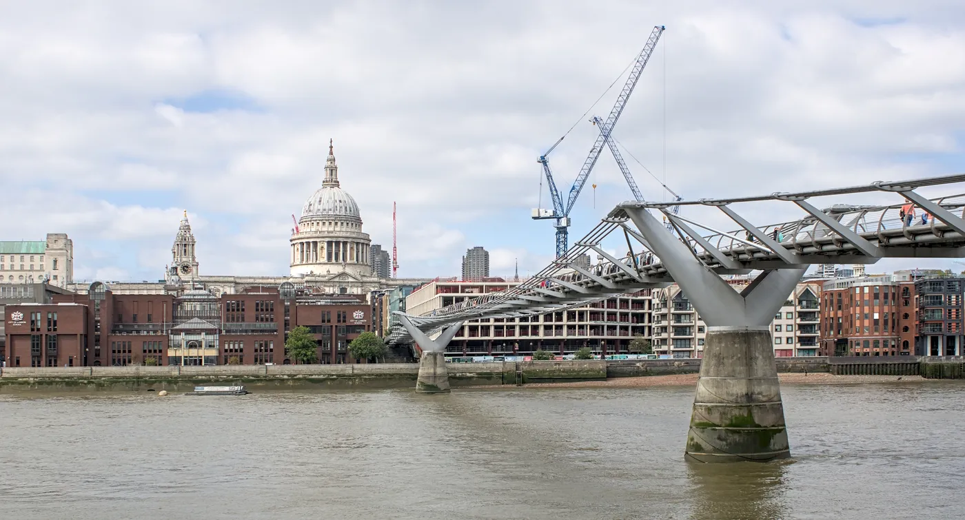 The Millennium Bridge crossing the Thames towards St Paul's Cathedral