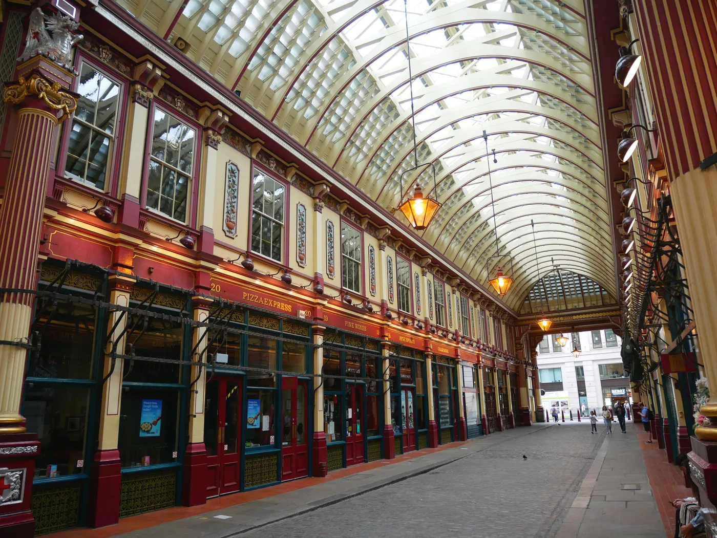 Painted Victorian ironwork and glass roof inside Leadenhall Market