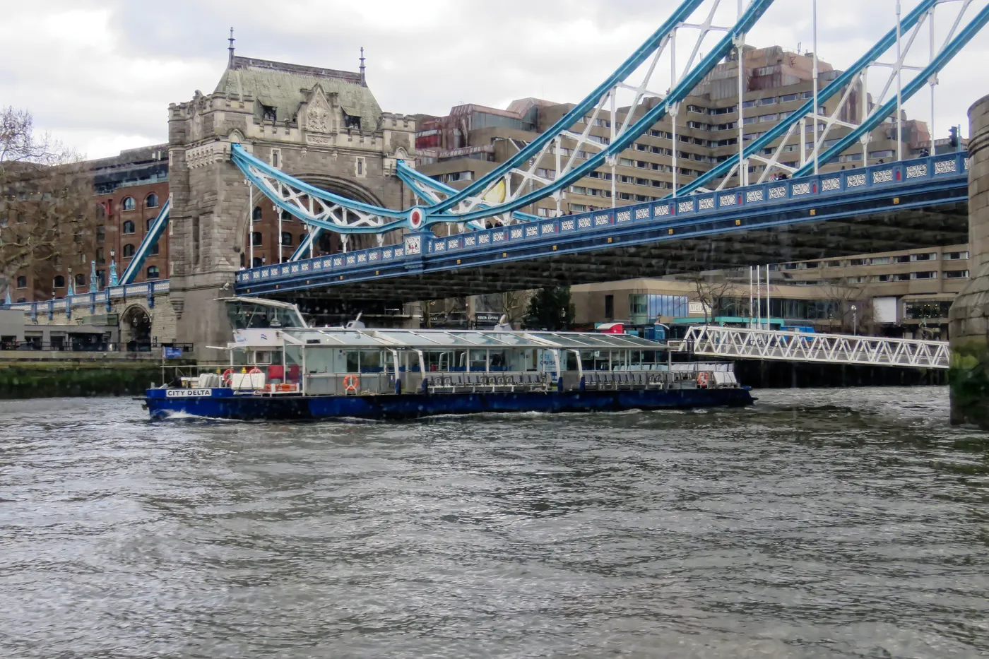 A sightseeing boat on the River Thames near Tower Bridge