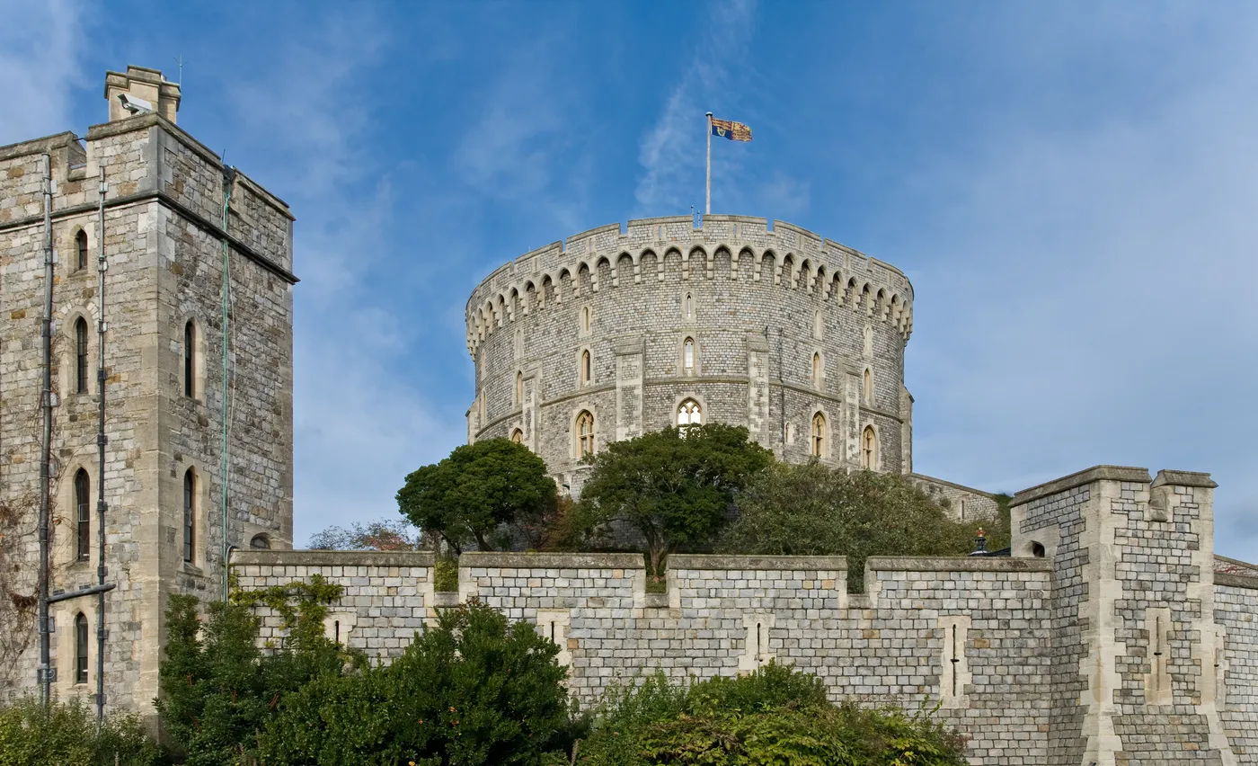 The Round Tower of Windsor Castle on its mound with the flag flying